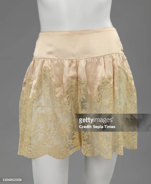 Underpants of pink crepe de chine trimmed with Blonde appliquŽ lace, Pink crepe de chine underpants with Blonde applique lace. Smooth stride across...