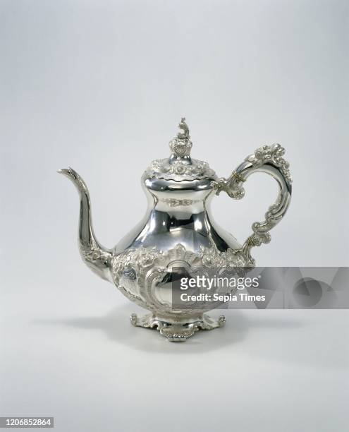 Coffee pot, pear-shaped, with rocailles and C- and S-volutes, The coffee pot has a loose bell-shaped lid, topped by a volute-shaped knob, a curved...