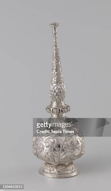 Rose-water bottle of silver driven with flower and leaf vines, Rose-water bottle on profiled foot with pear-shaped body and detachable elongated neck...