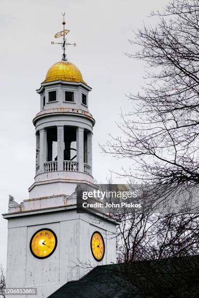 the first parish church steeple in historic concord, massachusetts - concord massachusetts stock pictures, royalty-free photos & images
