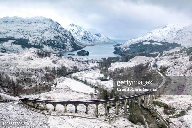 Winter in all its majesty at Glenfinnan Viaduct in the Scottish Highlands on January 29, 2020 in Glenfinnan, Scotland. The viaduct is well know to...