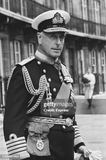 British royal Louis Mountbatten , 1st Earl Mountbatten of Burma, after he received the Order of Merit from the Queen, United Kingdom, 1965.