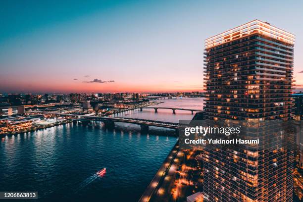 tokyo bayside skyline at dusk - toyosu stock pictures, royalty-free photos & images