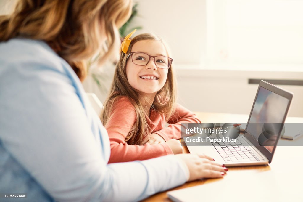 Laptop computer education mother children daughter girl familiy childhood