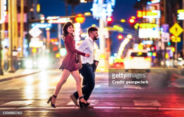 enjoying a night out together in las vegas - las vegas stock pictures, royalty-free photos & images