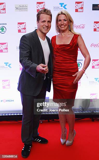 Jessica Kastrop and Oliver Pocher attend the Sport Bild Award 2011 at the Fischauktionshalle on August 8, 2011 in Hamburg, Germany.