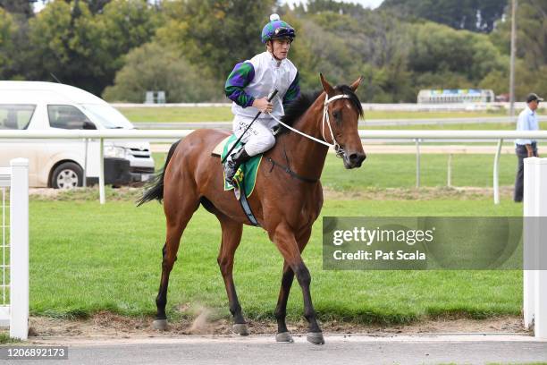 Jarrod Fry returns to the mounting yard on Mamelon after winning the bet365 Maiden Plate ,at Kyneton Racecourse on March 13, 2020 in Kyneton,...