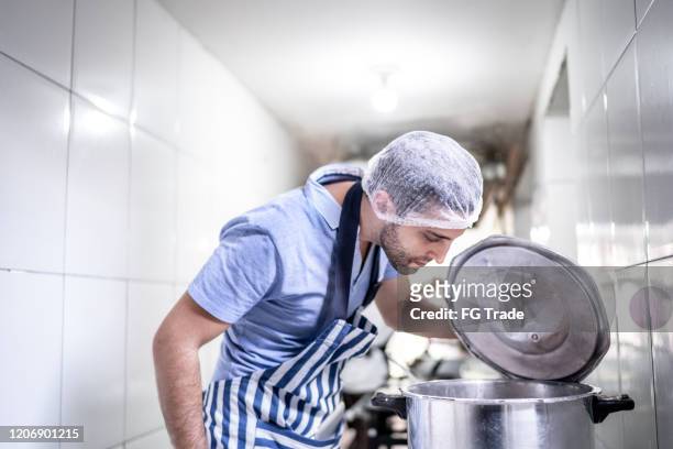 chef preparing food in restaurant - feijoada stock pictures, royalty-free photos & images