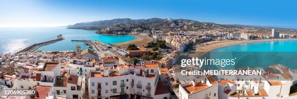 peniscola pesiscola lighthouse beach and village panoramic in castellon - castellon province stock pictures, royalty-free photos & images