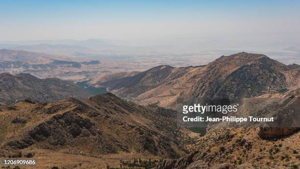 scenic view over the autonomous kurdistan region of iraq, taken from the mountains of kurdistan province in western iran - iraq stock pictures, royalty-free photos & images