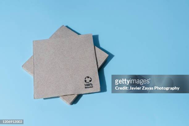 stack of recycled paper napkin - napkin stock pictures, royalty-free photos & images