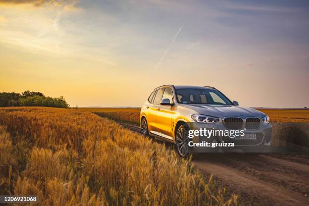 bmw x3 - bmw stock pictures, royalty-free photos & images