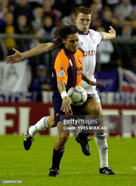 Anderlecht's Joris Van Hout fights for the ball with Roma's Francesco Totti during their UEFA European Champions League group A soccer match...
