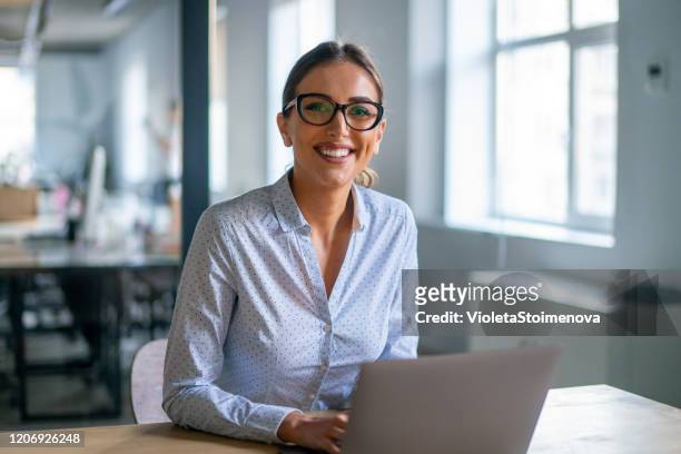 businesswoman working on computer in the office. - secretary stock pictures, royalty-free photos & images
