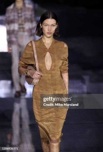 Bella Hadid walks the runway at the Burberry show during London Fashion Week February 2020 on February 17, 2020 in London, England.