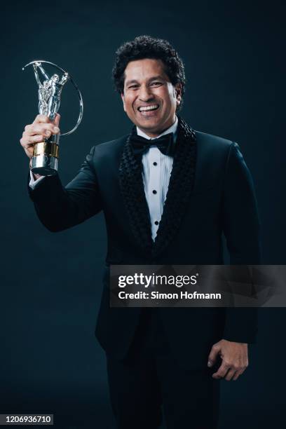 Laureus Best Sporting Moment winner Sachin Tendulkar poses with the trophy at the Verti Hall during the 2020 Laureus World Sports Awards on February...