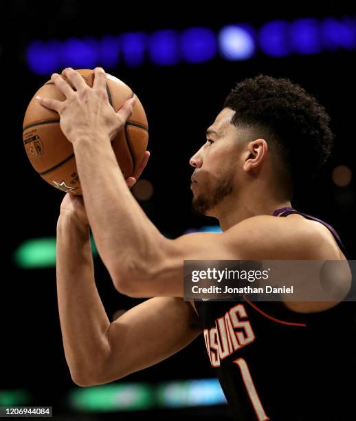 Devin Booker of the Phoenix Suns in the 2020 NBA All-Star - MTN DEW 3-Point Contest during State Farm All-Star Saturday Night at the United Center on...