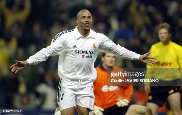 Real Madrid's Brazilian Ronaldo celebrates after scoring his team second goal during the Champions League Real Madrid vs Borussia Dortmund match...