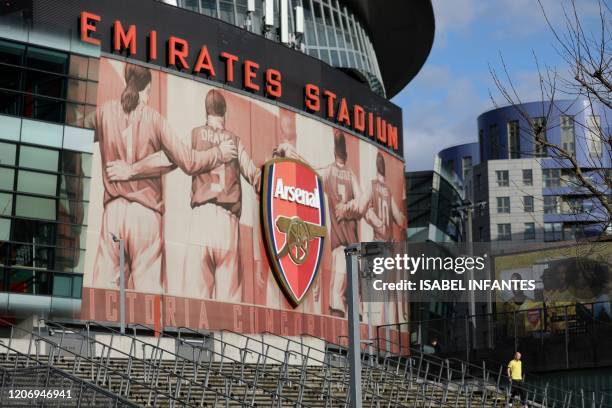 General view is pictured of the Emirates Stadium in London on March 13, 2020. - The English Premier League suspended all fixtures until April 4 on...