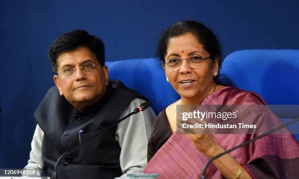 Union Finance Ministers Nirmala Sitharaman addresses the media during a press conference in the presence of Union Minister of Railways and Commerce...