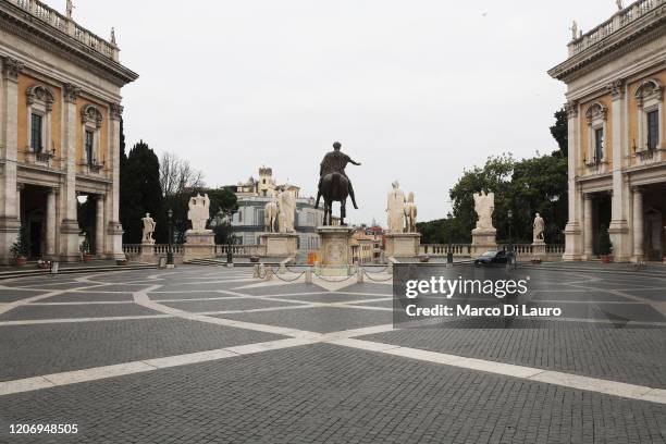 The Campidoglio is seen completely empty on March 13, 2020 in Rome, Italy. Rome's streets were eerily quiet on the second day of a nationwide...