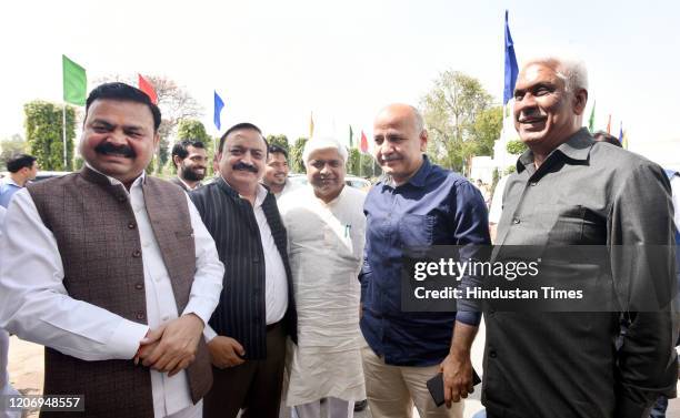 MLAs Pawan Sharma, Rishi Raj, Delhi Minister for Water, Tourist, Culture, Arts and Languages Rajendra Pal Gautam, Deputy Chief Minister Manish...