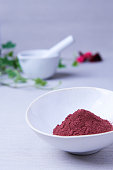 A bowl of the ayurvedic powder Hibiscus (Hibiscus sabdariffa)