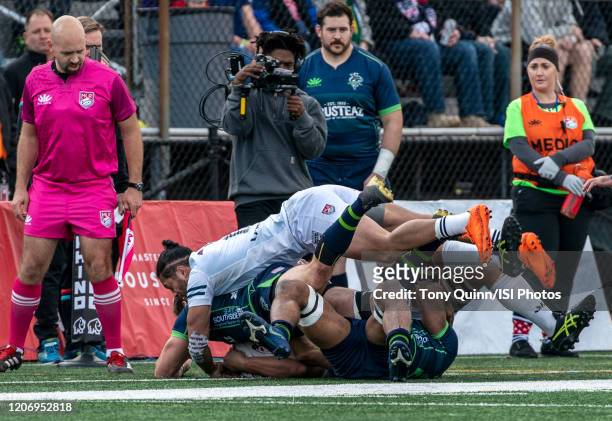 Brock Staller of the Seattle Seawolves comes down hard on David Bushby of the Seattle Seawolves during a game between Seattle Seawolves and Old Glory...