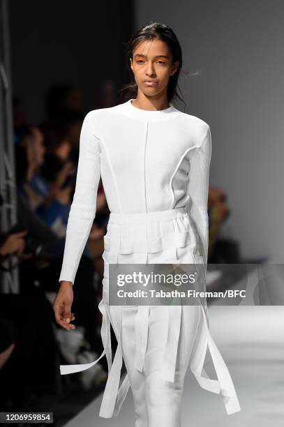 Model walks the runway at the Apujan Autumn/Winter 2020 event during London Fashion Week February 2020 at the Grand Connaught Rooms on February 17,...