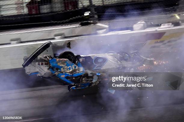 Ryan Newman, driver of the Koch Industries Ford, flips over as he crashes during the NASCAR Cup Series 62nd Annual Daytona 500 at Daytona...