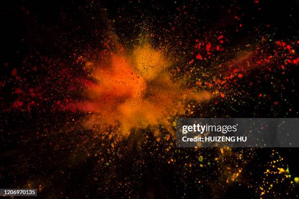 explosion of colored powder on black background - powder throw fotografías e imágenes de stock