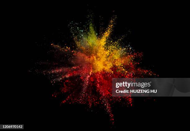 colored powder explosion on black background - powder throw fotografías e imágenes de stock