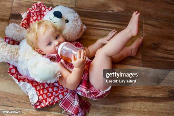 just kicking it back with my best pal - baby kicking stock pictures, royalty-free photos & images