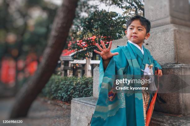 5 years old boy wearing kimono for shichigosan - shichi go san stock pictures, royalty-free photos & images