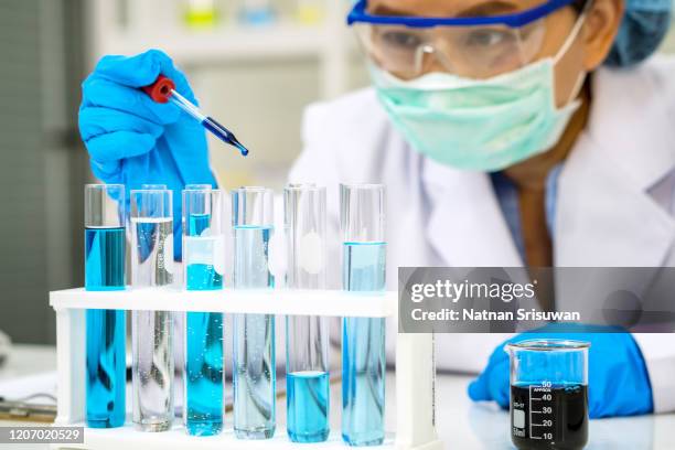 scientist with equipment and science experiments. - person screened for cancer stock pictures, royalty-free photos & images