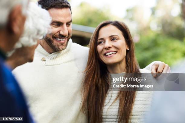 happy family spending leisure time in backyard - father in law stock pictures, royalty-free photos & images