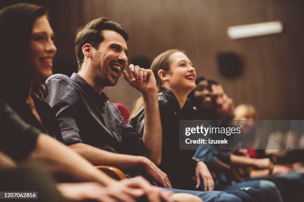 group of excited people in the movie theater - comedian stock pictures, royalty-free photos & images