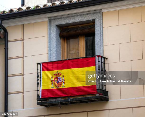 spanish flag on a balcony. - bandera españa fotografías e imágenes de stock