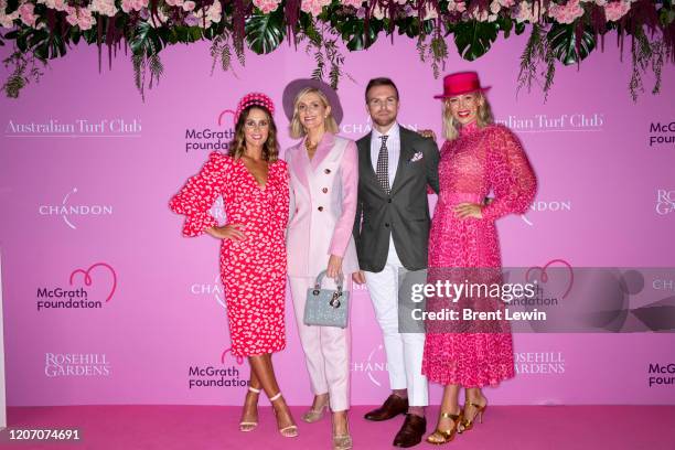 Cathy McEvoy, left, Kate Waterhouse, Michael Brown and Phoebe Burgess arrive during Chandon Ladies Day at Rosehill Gardens Racecourse on March 14,...