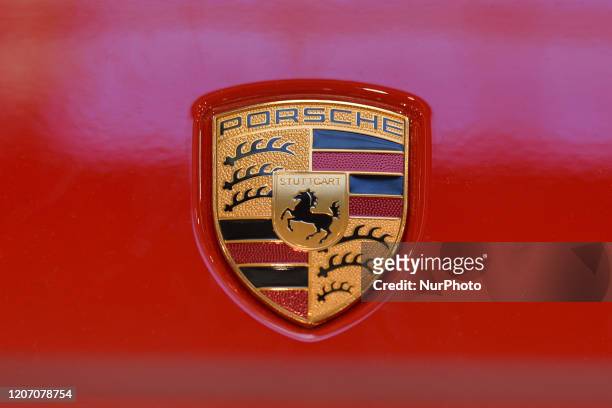 Porsche logo seen on Porsche 911 Carrera 4 992 at Porsche cars exhibition inside Galeria Krakowska Shopping Mall. On Saturday, 12 March 2020, in...