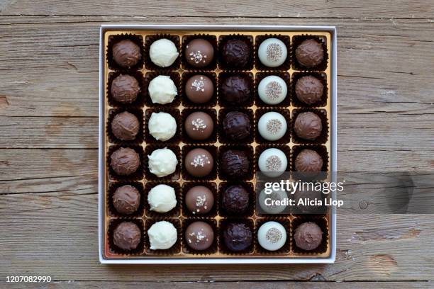 box of chocolates - praline stock pictures, royalty-free photos & images