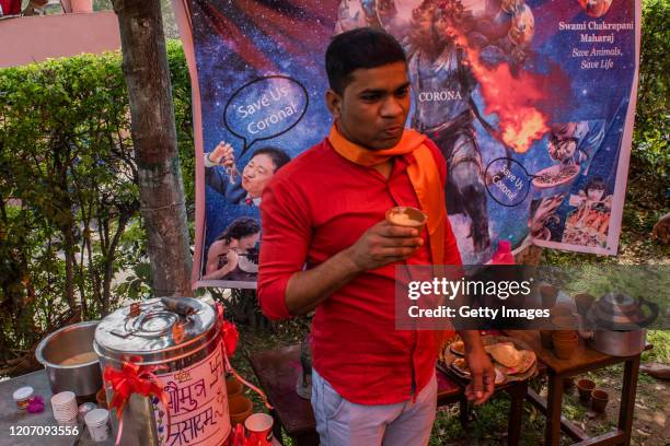 Member and supporter of 'Akhil Bharat Hindu Mahasabha' a Hindu organisation drinks panchagavya, a traditional Hindu ritual mixture made of cow dung,...