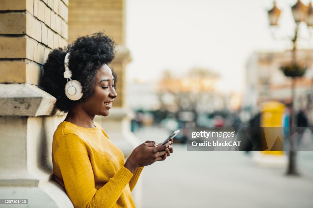 Young woman listening music