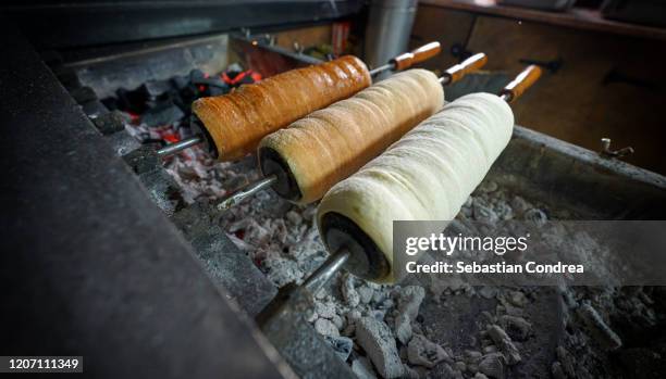 hungarian a round loaf with the cinnamon and brown sugar, cluj-napoca, romania. - cluj-napoca romania stock pictures, royalty-free photos & images