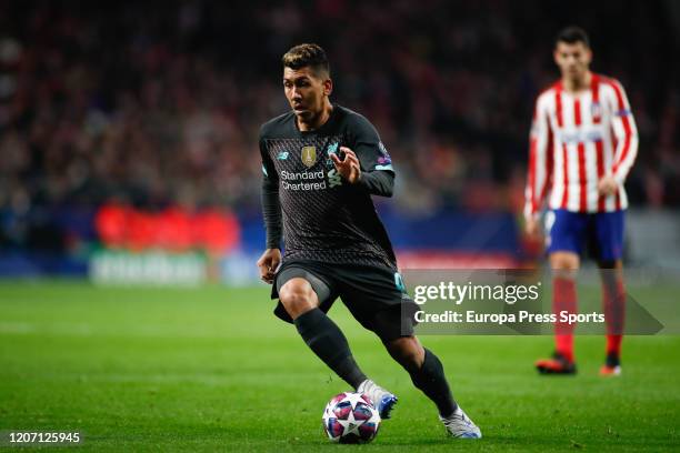 Roberto Firmino of Liverpool in action during the UEFA Champions League football match, round 16, played between Atletico de Madrid and Liverpool FC...