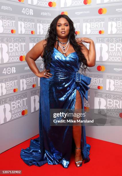 Lizzo poses in the winners rooms at The BRIT Awards 2020 at The O2 Arena on February 18, 2020 in London, England.