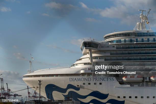 The quarantined Diamond Princess cruise ship sits docked at Daikoku Pier on February 19, 2020 in Yokohama, Japan. About 500 passengers who have...