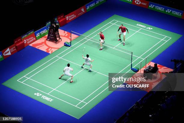 Russia's Vladimir Ivanov and Russia's Ivan Sozonov play against Japan's Hiroyuki Endo and Japan's Yuta Watanabe during their All England Open...