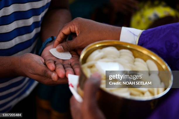 Communion By Hand Hands Communion Photos and Premium High Res Pictures - Getty Images