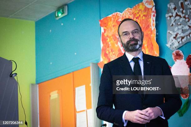 French Prime minister and candidate running as Le Havre's city mayor Edouard Philippe looks on after casting his vote during the first round of...